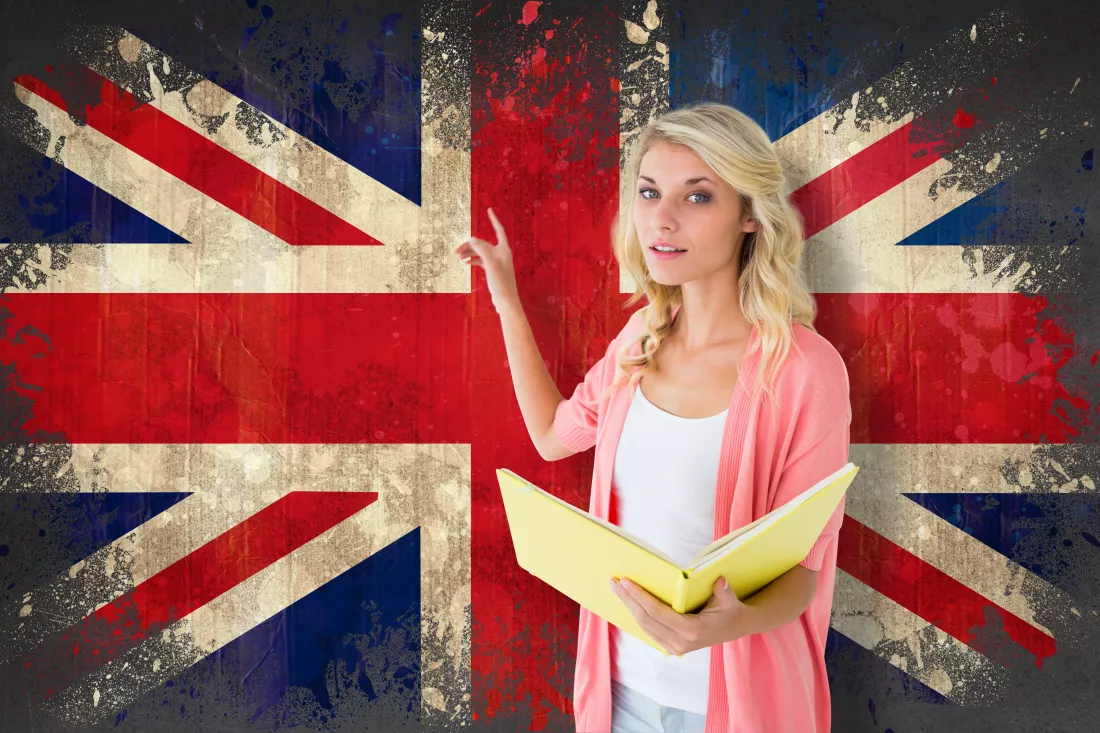 young-pretty-student-pointing-reading-against-union-jack-flag-grunge-effect